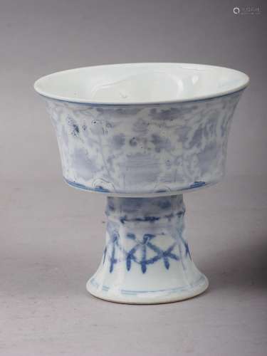 A Chinese porcelain blue and white stem cup with faulty glaz...