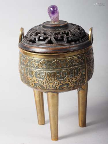 A Chinese brass censor with engraved decorated and carved wo...