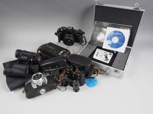 A Digica camera, in metal carry case, and other cameras and ...