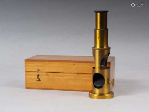 A brass portable microscope, in case, with three lenses, 6 1...