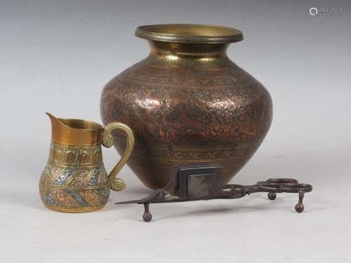 An Indian engraved brass and copper water pot, 5 1/2 high, a...
