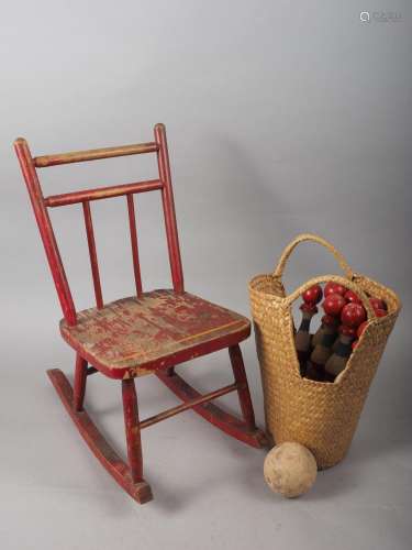 A dolls painted hardwood rocking chair, a childs wooden whee...