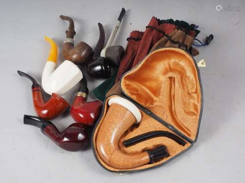 A Meerschaum and turned wood smoking pipe, in fitted black c...