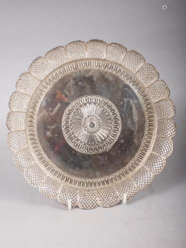 An Oriental white metal pierced and engraved shallow dish, 9...