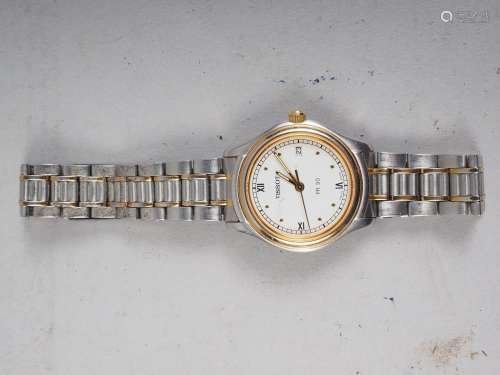 A ladys Tissot stainless steel bracelet watch with white ena...