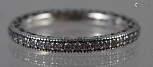 A platinum and diamond eternity ring, size L, 2g