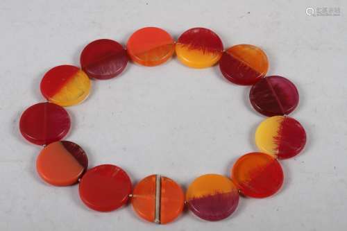A late 20th century acrylic disc necklace, 19 long