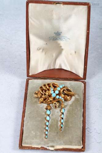 A Victorian yellow metal and turquoise set memento brooch wi...