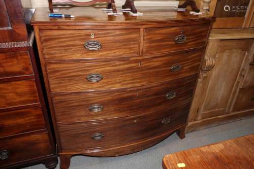 A 19th century mahogany bowfront chest of two short and thre...