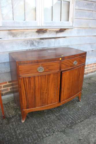 A 19th century bowfront side cupboard, fitted two drawers ov...