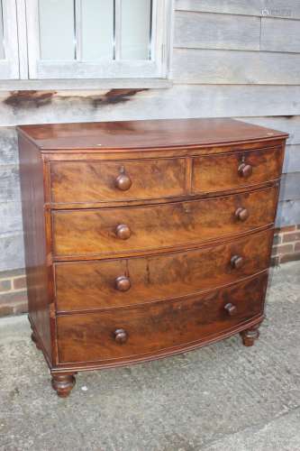 A 19th century figured mahogany bowfront chest of two short ...