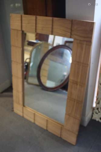 A modern carved oak framed wall mirror, plate 21 1/2 x 35 1/...