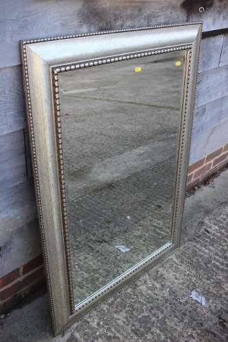 A silvered frame wall mirror with bevelled plate, 23 x 35, a...