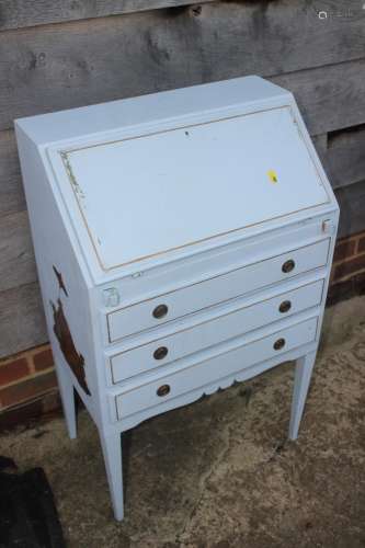 A childs blue painted bureau with painted gilt figure decora...