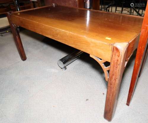 A mahogany coffee table of Georgian design, on chamfered and...