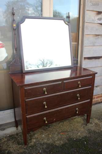 An Edwardian mahogany dressing chest with mirror over two sh...