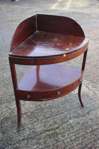 A mahogany bowfront corner washstand, fitted one drawer, on ...