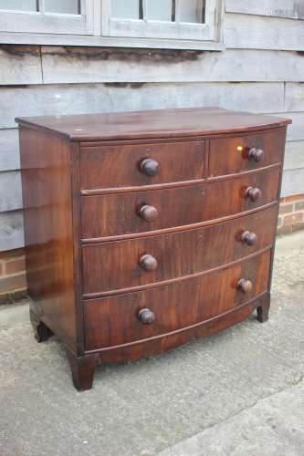 A mahogany bowfront chest of two short and three graduated l...