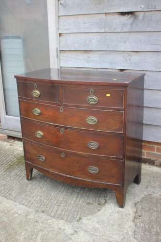 A mahogany bowfront chest of two short and three graduated l...