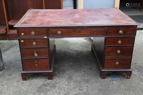 A partners mahogany double pedestal desk, fitted two drawers...