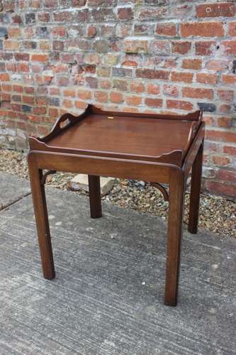 A mahogany tray top lamp table, on moulded chamfered support...