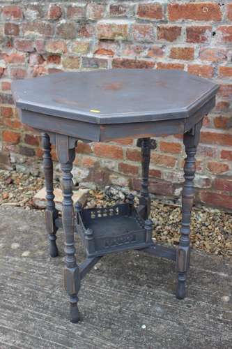 An octagonal painted walnut two-tier occasional table, on tu...