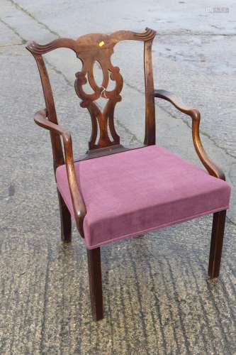 A Georgian mahogany carved dining chair with pierced splat b...