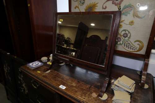 A 19th century reeded mahogany swing frame toilet mirror, on...