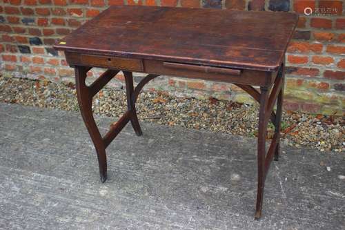 A Globe Wernicke oak folding table, fitted drawers and slide...