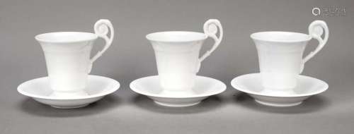 Three large cups with saucers,