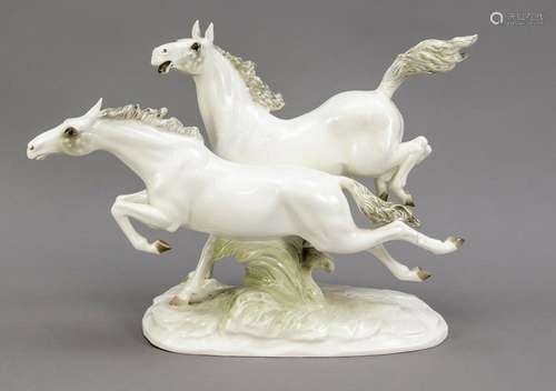 Pair of galloping white horses