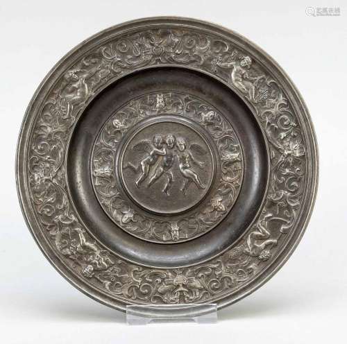 Iron plate with relief decorat