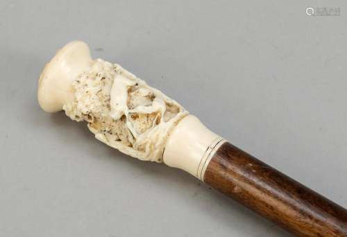 Walking stick with carved pomm