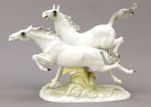 Pair of galloping white horses