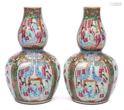 A pair of Chinese Canton double gourd famille rose vases: th...