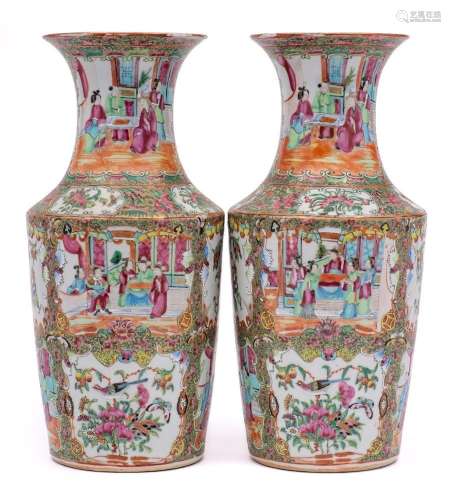 A pair of Chinese Canton famille rose vases: with waisted ne...
