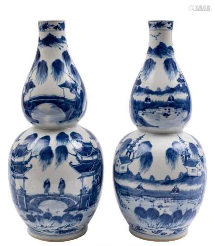 A pair of Chinese blue and white double gourd vases: each pa...
