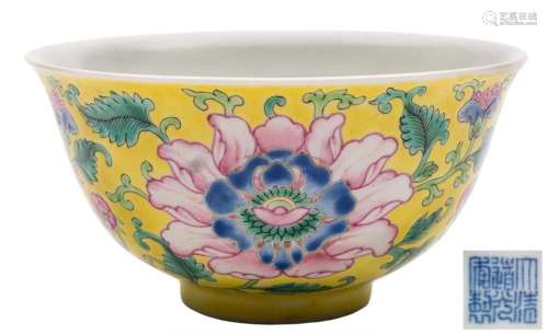 A Chinese yellow-ground famille rose peony bowl: finely enam...