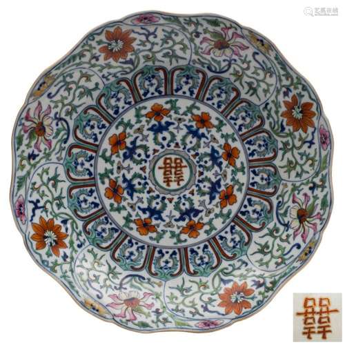 A Chinese doucai moulded lotus dish: the sides moulded with ...