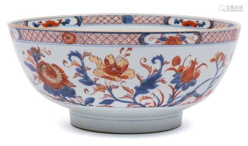 A Chinese Imari bowl: painted with pomegranate, peony,