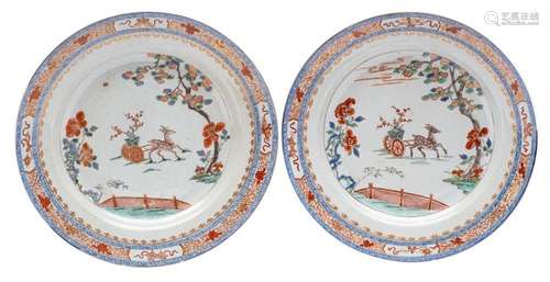 A pair of Chinese verte-imari chargers: each painted with a ...