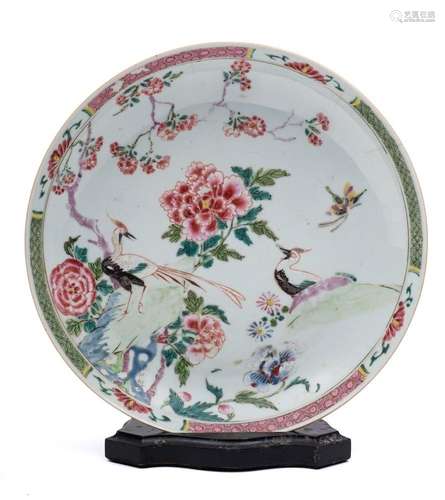 A Chinese famille rose saucer dish: painted with cranes amon...