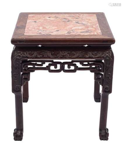 A Chinese hardwood stand with marble top: carved with scroll...