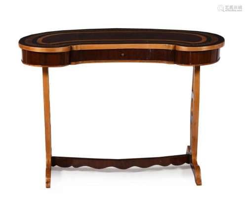 A mahogany and parquetry kidney shaped desk