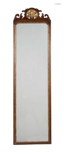A mahogany and parcel gilt wall mirror in early George III s...
