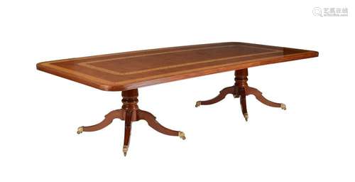 Y A mahogany and satinwood crossbanded twin pedestal dining ...