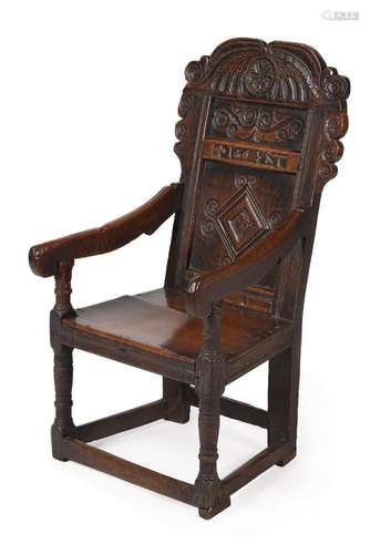 An oak wainscot armchair