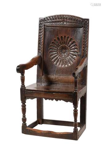 An oak wainscot armchair