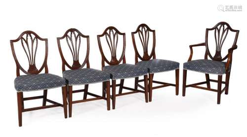 A set of eight George III dining chairs