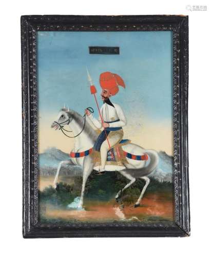A reverse painted glass portrait of a gentleman on horseback
